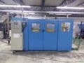 Máquina Termoformadora vacuum forming automatica de corrente. Imagem Máquina Termoformadora vacuum forming automatica de corrente.